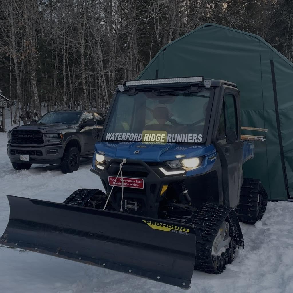 Waterford Ridge Runners tracked grooming vehicle staged in the snow